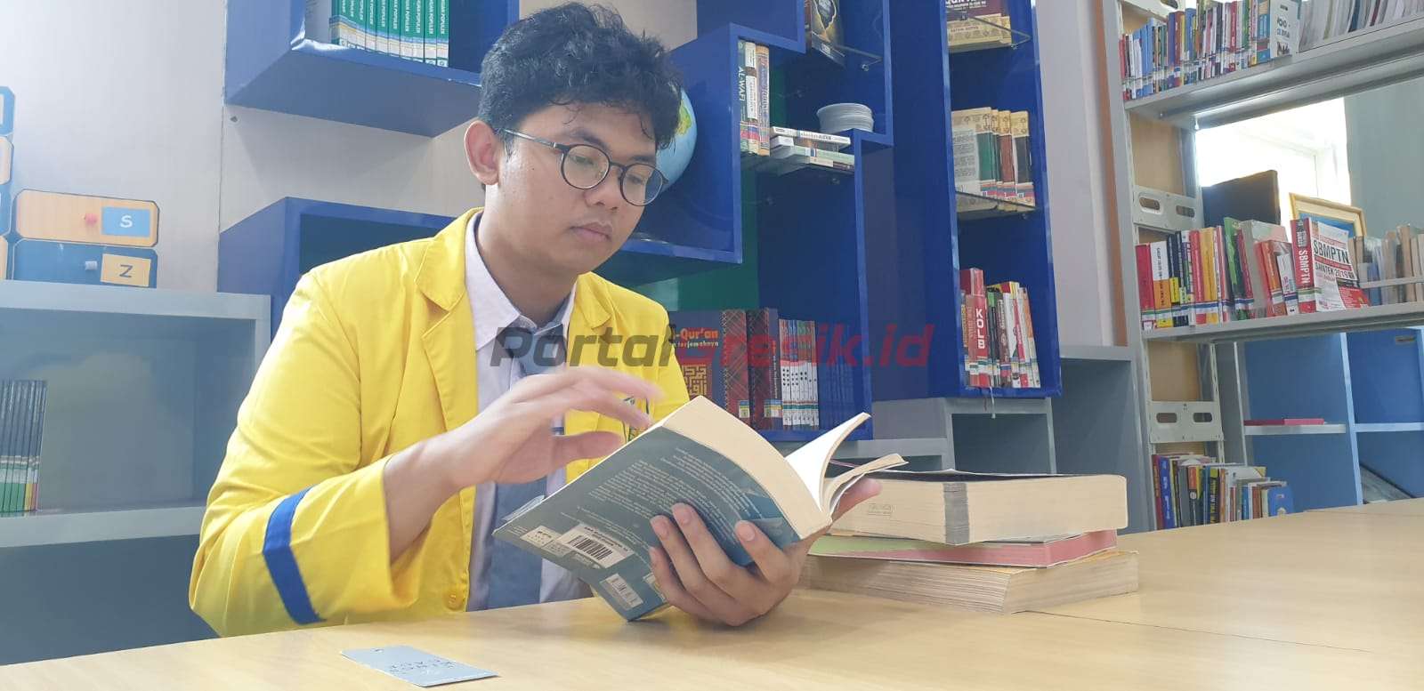Siswa SMA Muhammadiyah 10 GKB Gresik (Smamio) M. Fadel Thoriq Dharmawan saat ditemui di Ruang Perpustakaan Smamio, Jumat (31/3/2023).