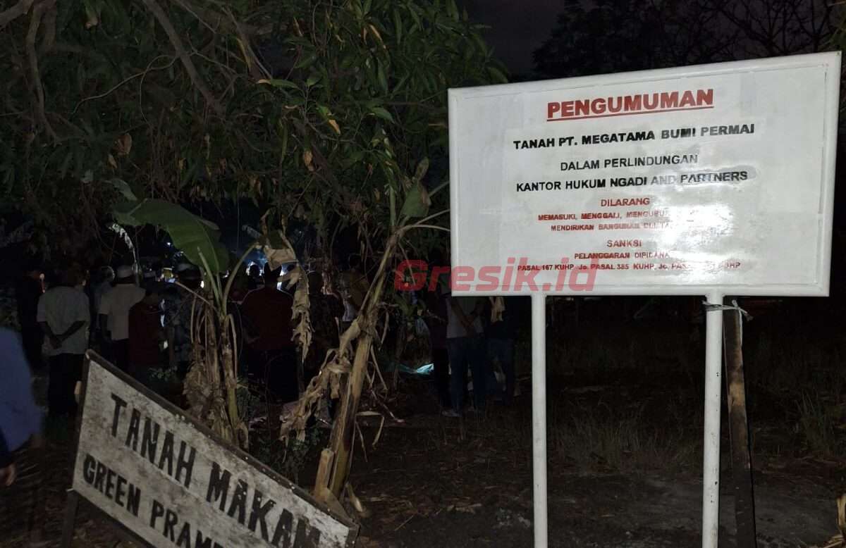 Papan larangan yang dipasang PT Megatama di fasum makam warga Perumahan GBR