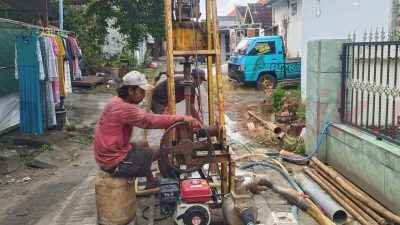 Pemdes Asempapak Bangun Sumur Resapan, Banjir di RT 1 Kini Teratasi