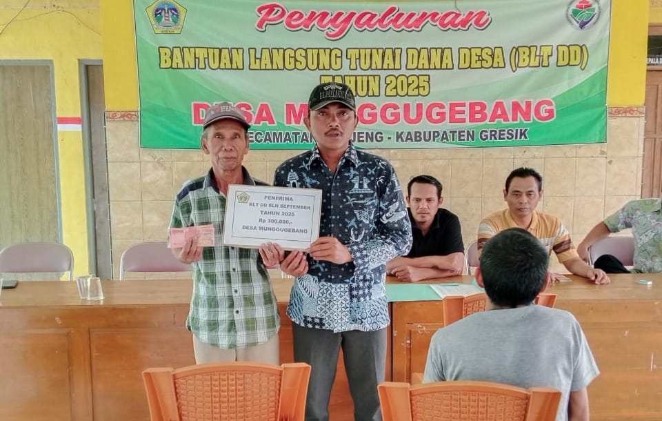 Pemerintah Desa (Pemdes) Munggugebang, Kecamatan Benjeng, Kabupaten Gresik, kembali menyalurkan Bantuan Langsung Tunai Dana Desa (BLT-DD) tahap ke-9 tahun anggaran 2025.